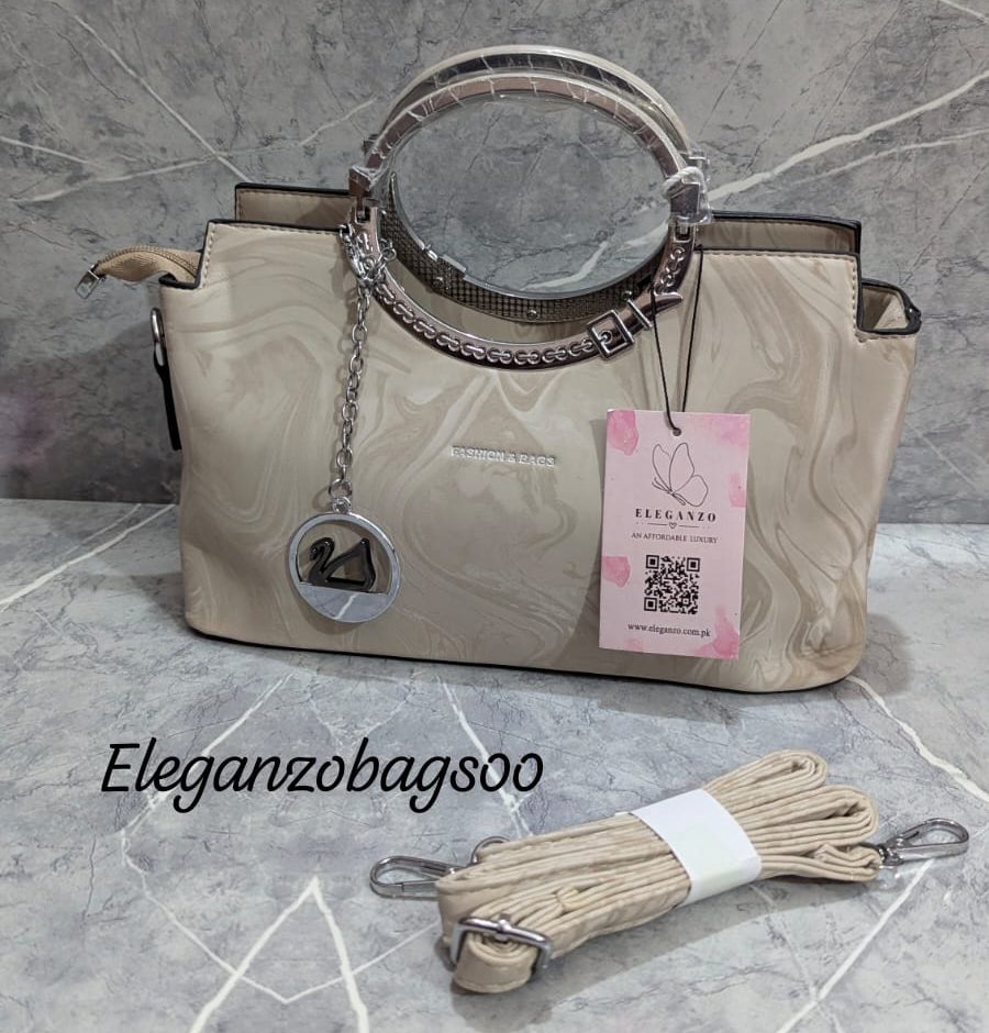 elegant cross body bag with duck keychain